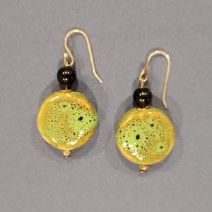 Drop earrings with black and green bead